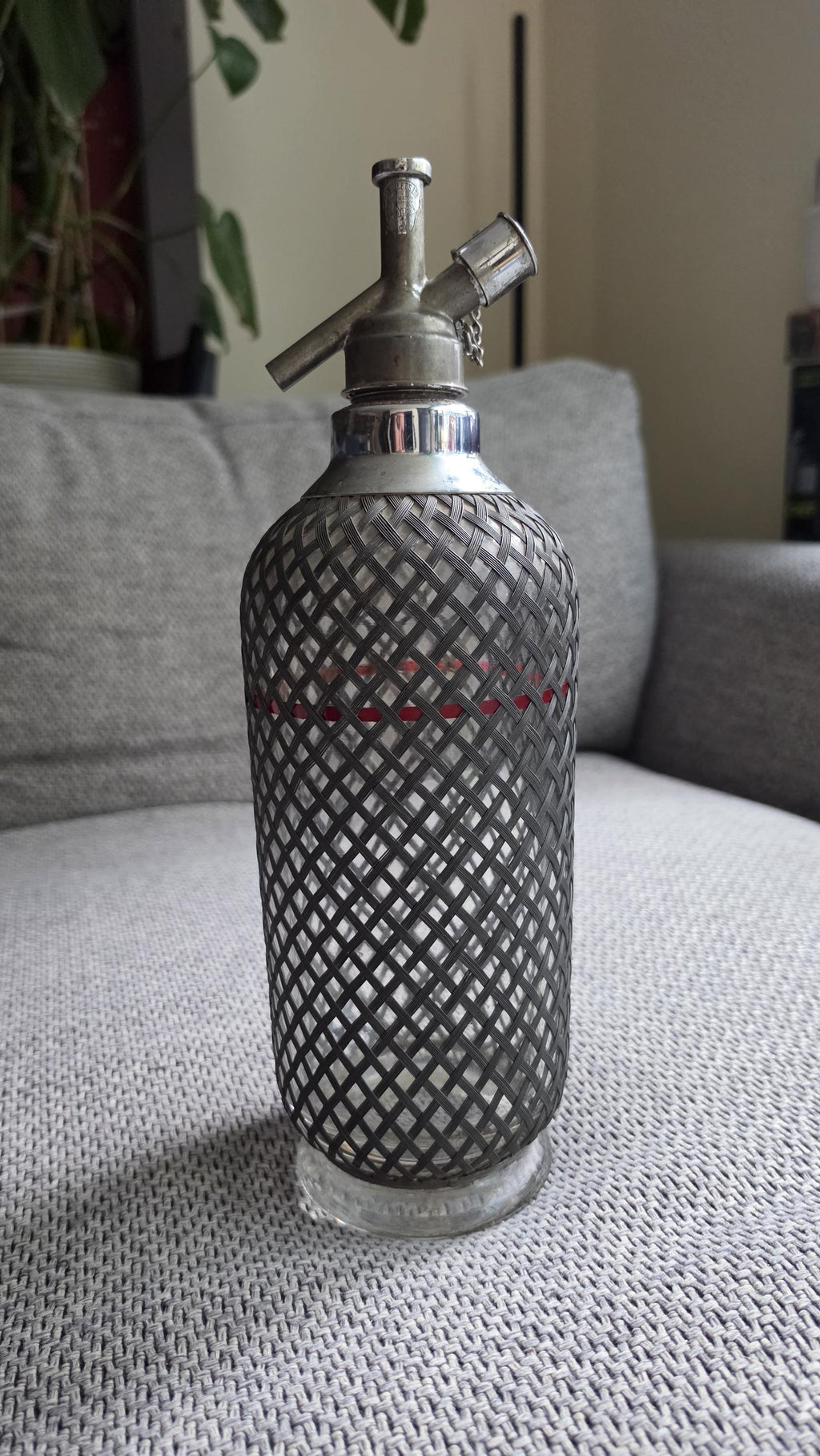 Vintage Soda Siphon Bottle, Mid Century Seltzer Syphon with Metal Mesh Cover, Bar Decor, Industrial Glass Bottle